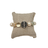 The Woods Pearl and Mother of Pearl Bracelet with large diamond and pearl charm